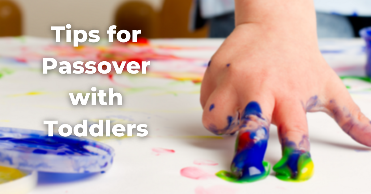 Blurry image of child's hand painting with the words Tips for Passover with Toddlers