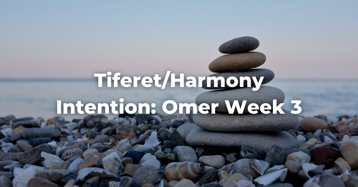 image of stones at the beach with a stack of stones on the right with the words: Tiferet/Harmony Intention: Omer Week 3